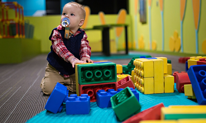 Child playing with buliding blocks